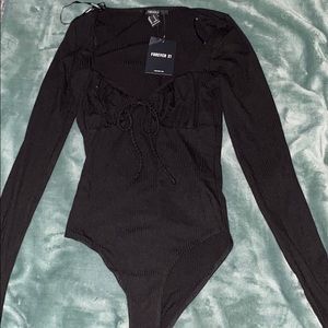 Small Black bodysuit.